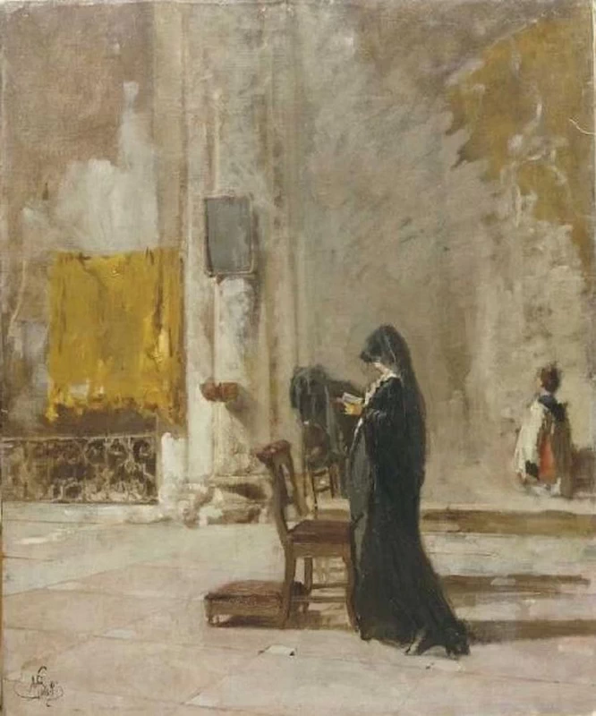Una signora che prega in chiesa